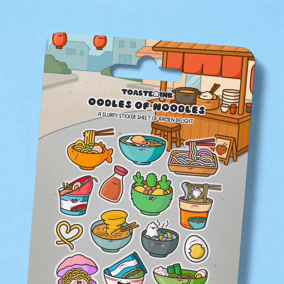 Close up of ramen noodles sticker sheet on blue desk