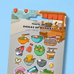 Close up of ramen noodles sticker sheet on blue desk
