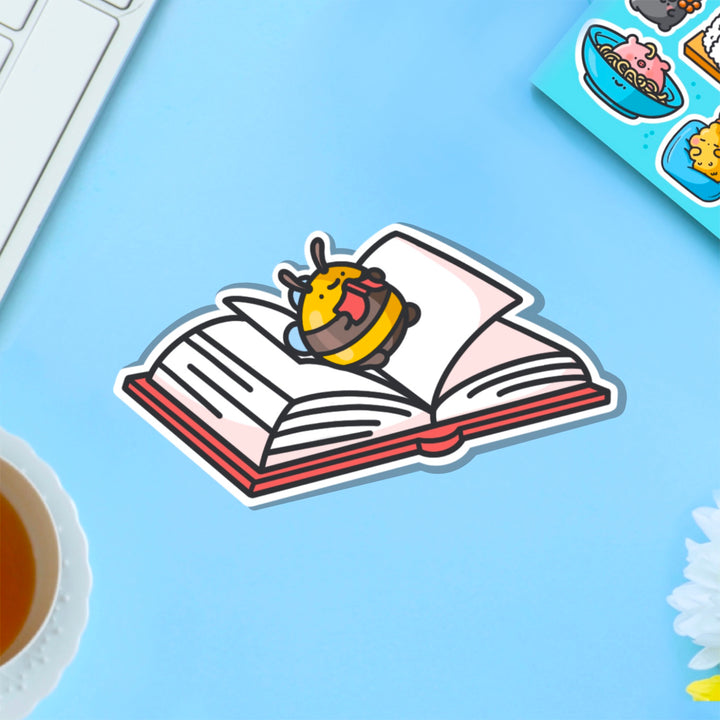 Reading bee vinyl sticker on blue table