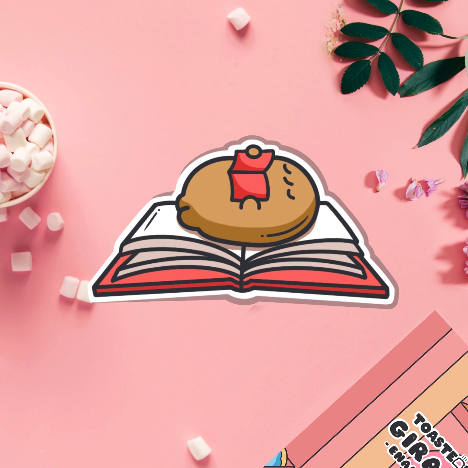Reading potato vinyl sticker on pink table
