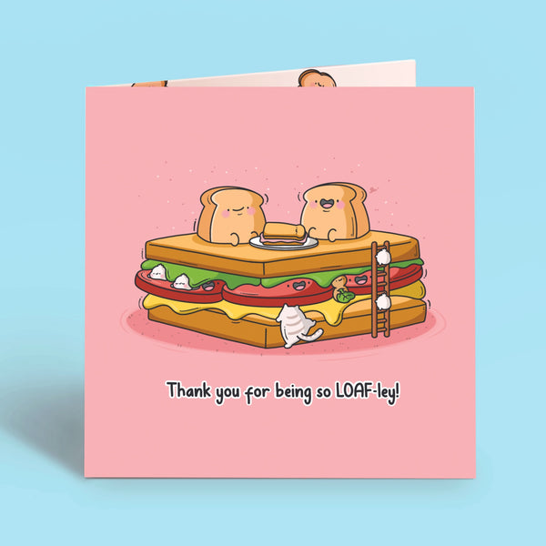 Sandwich greetings card on blue table