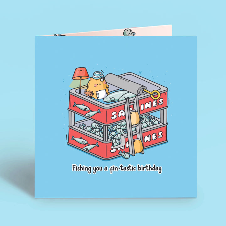 sardines birthday card on blue table