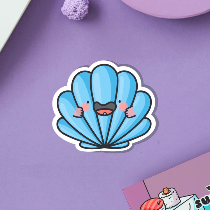 sea shell vinyl sticker on purple table