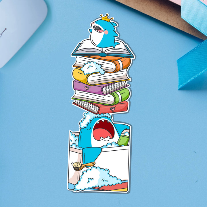 Shark bookmark on blue table