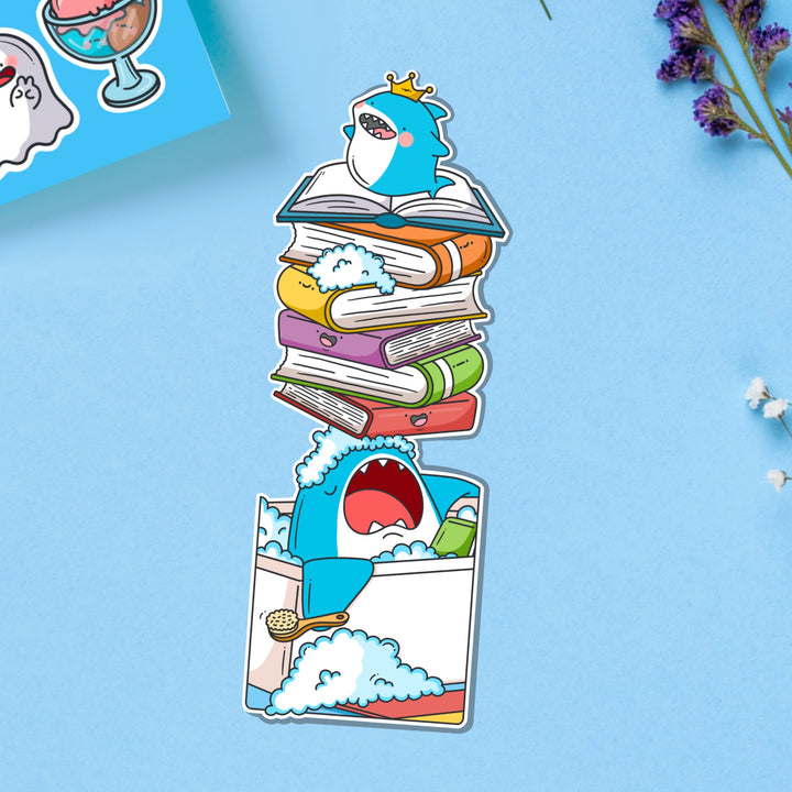 Shark bookmark on blue table with stickers