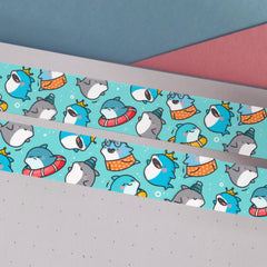 Blue shark print washi tape on blue and pink table