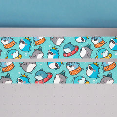 Blue shark print washi tape on notebook and blue background