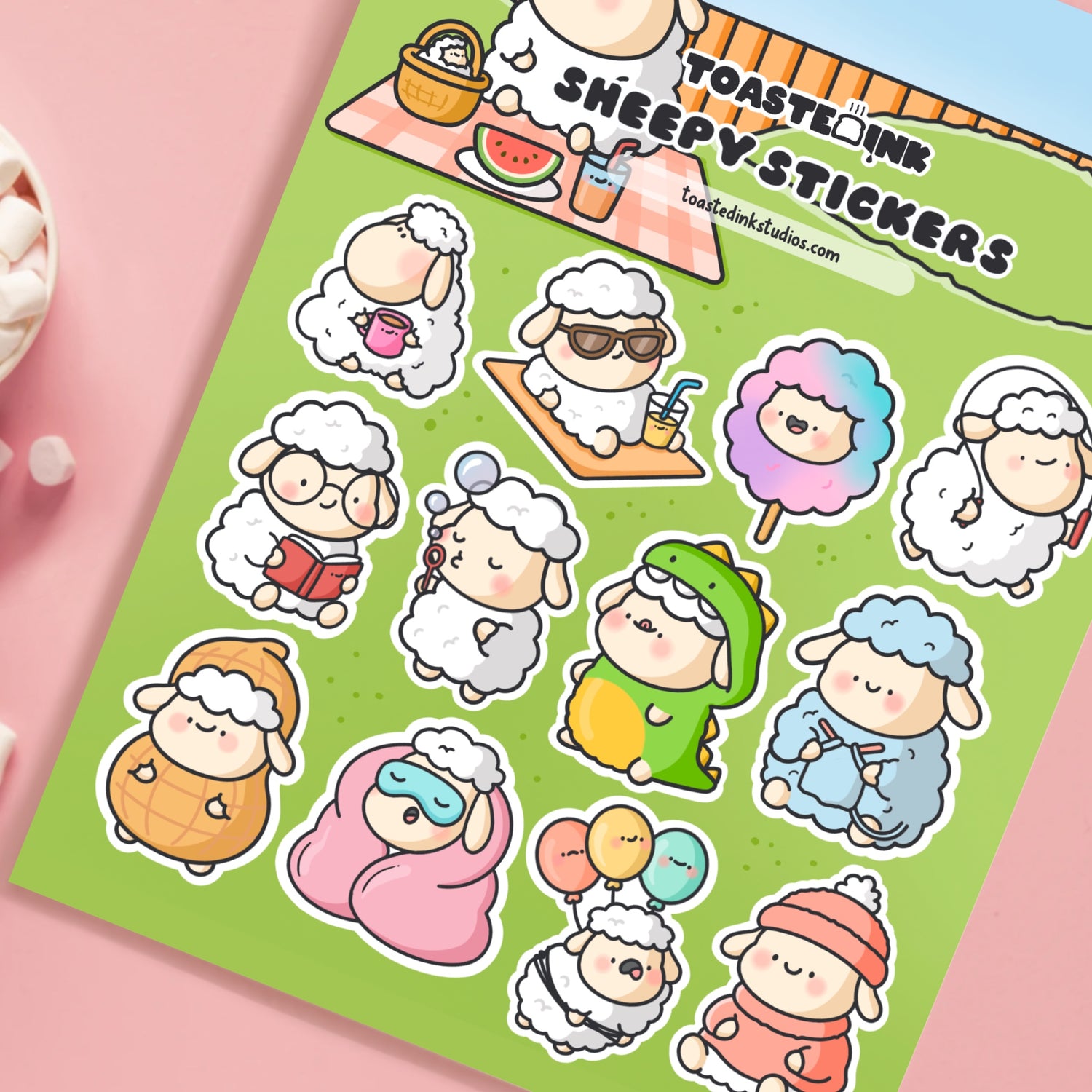 Sheep stickers on pink desk with marshmallows