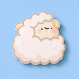 Sheep shaped sticky notes on blue table