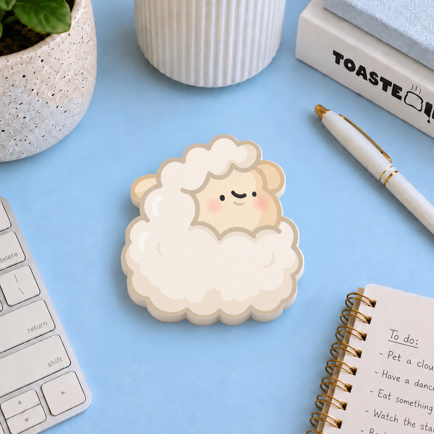 Sheep sticky notes on blue desk