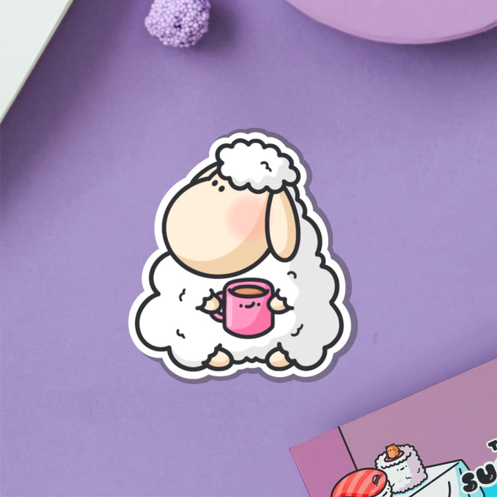 Sheep vinyl sticker on purple table