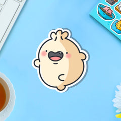 skipping dumpling vinyl sticker on blue table