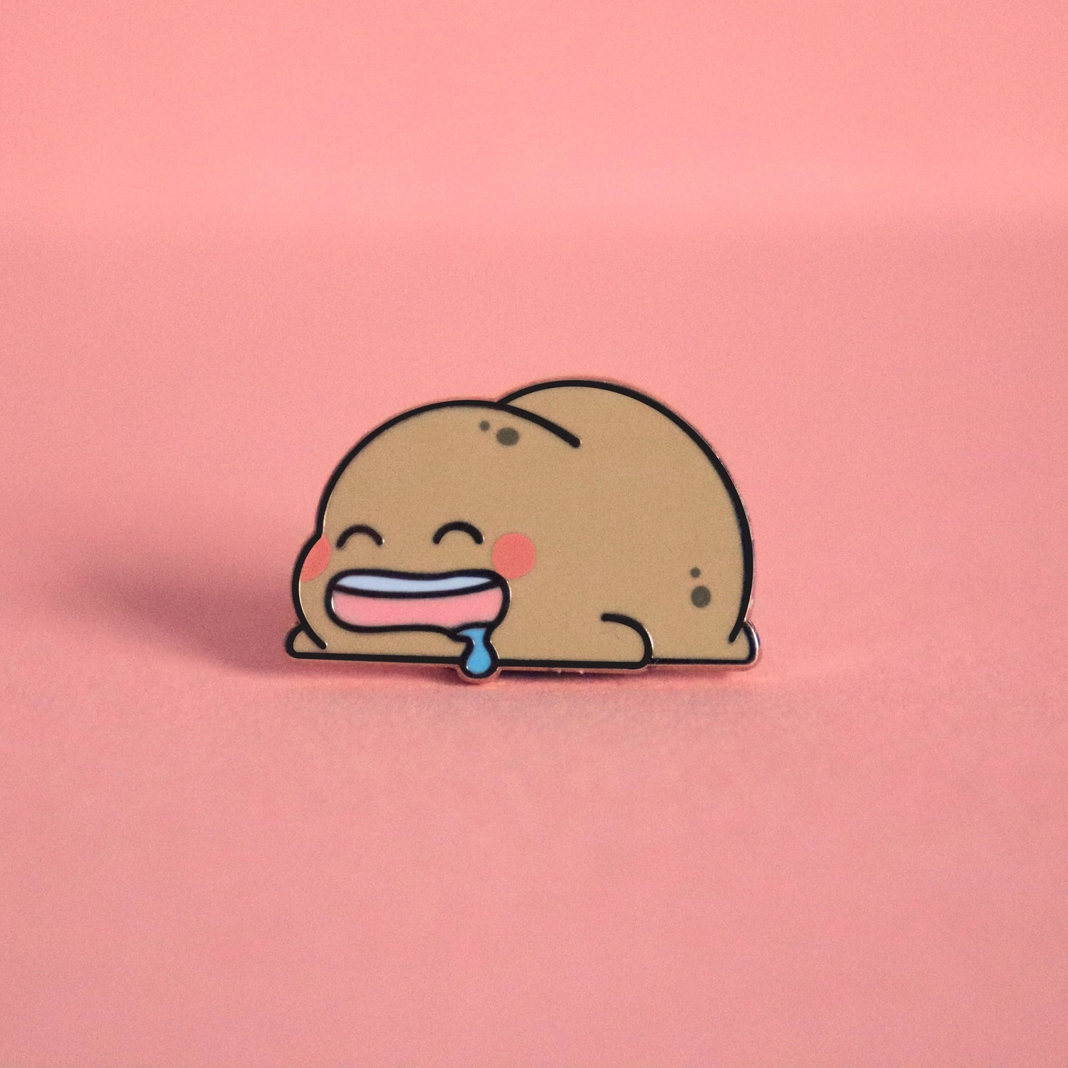 Sleeping Potato pin on pink background