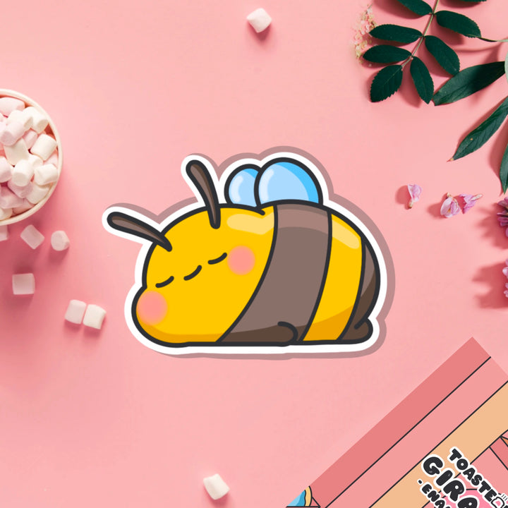 Sleepy Bee vinyl sticker on pink table