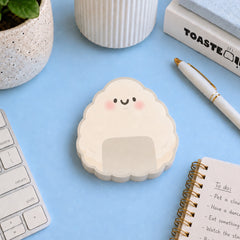 Onigri sushi sticky notes on blue desk with stationery