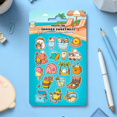 Summer sticker sheet on table with stationery scattered around