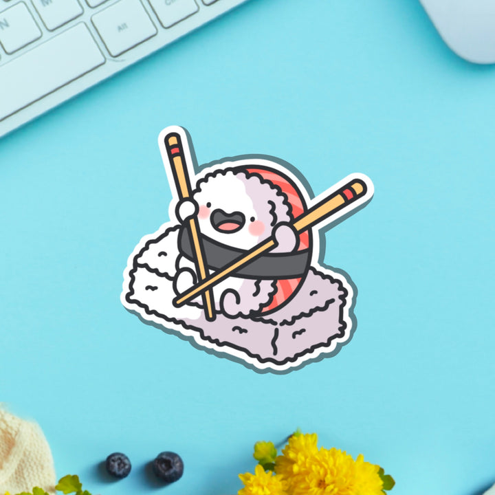 sushi holding chopsticks vinyl sticker on green table