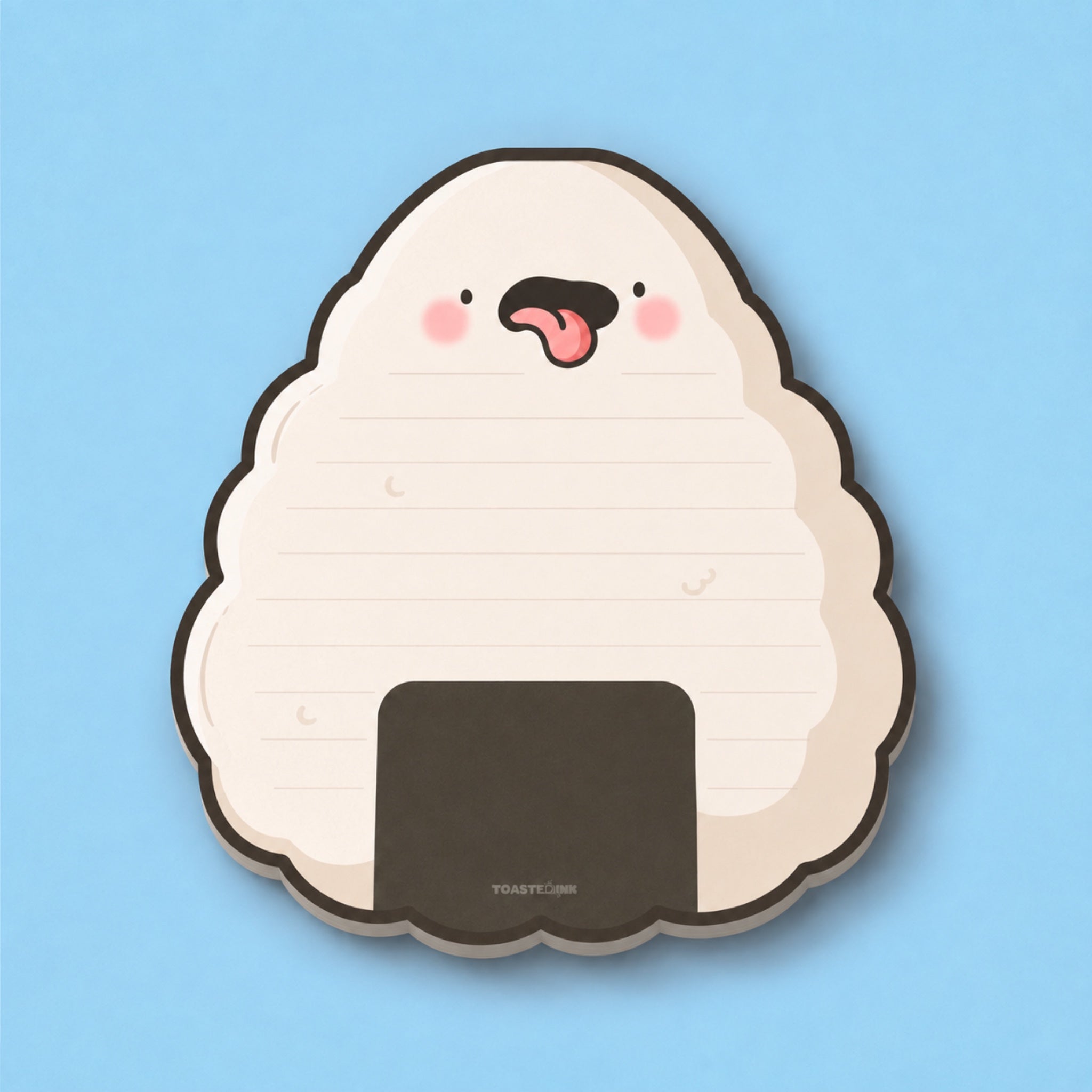 A cute onigiri-shaped notepad with a lined writing surface, pink cheeks, cheeky face, and a dark brown seaweed band, shown on a solid light blue background.