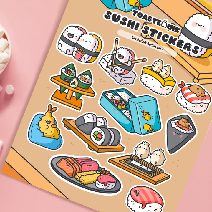 Sushi sticker sheet n pink table close up