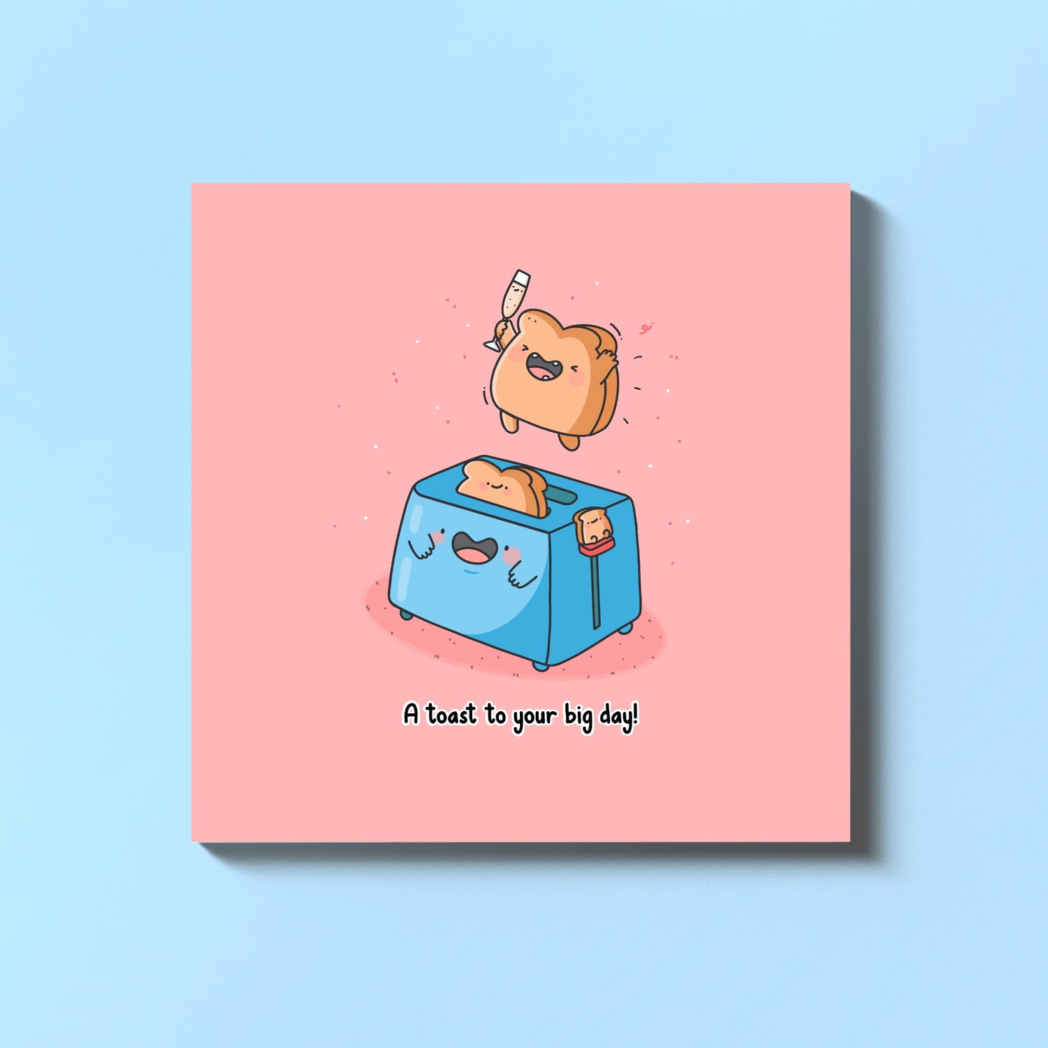 Toaster greeting card on blue table