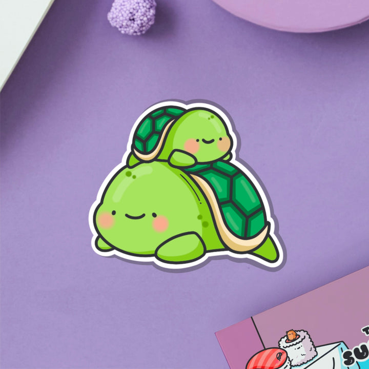 Turtle vinyl sticker on purple table