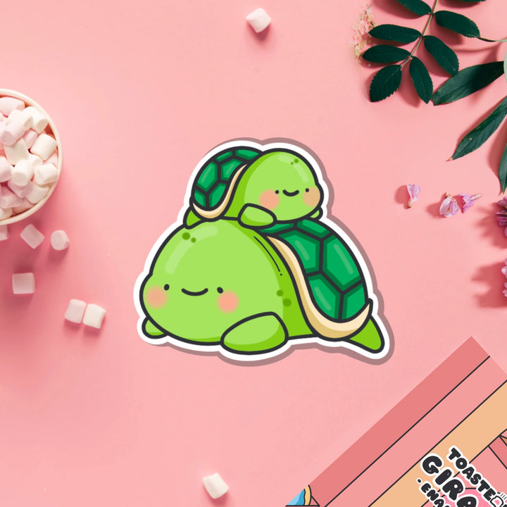 Turtle vinyl sticker on pink table