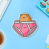 Bear in underwear vinyl sticker on blue table