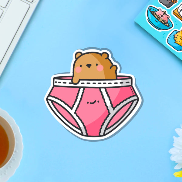 Bear in underwear vinyl sticker on blue table