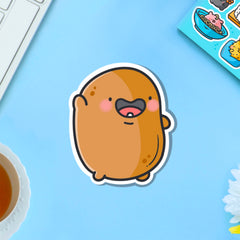 Waving potato vinyl sticker on blue table