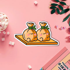 Wontons vinyl sticker on pink table