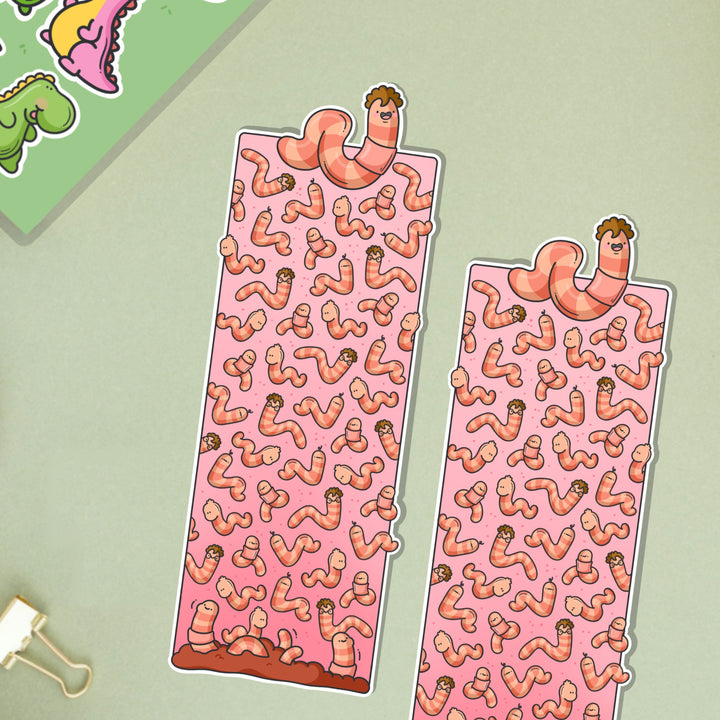 Worm bookmark on green table