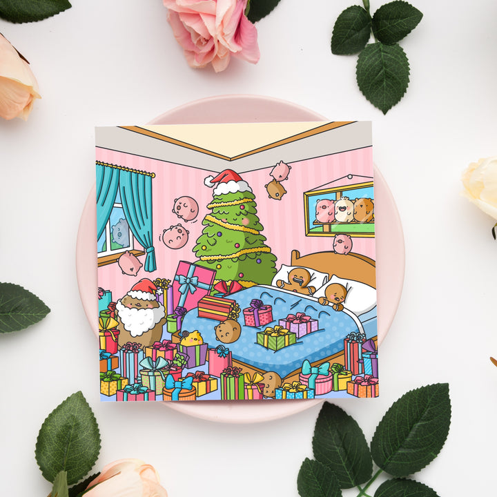 Cute Christmas presents card on pink plate