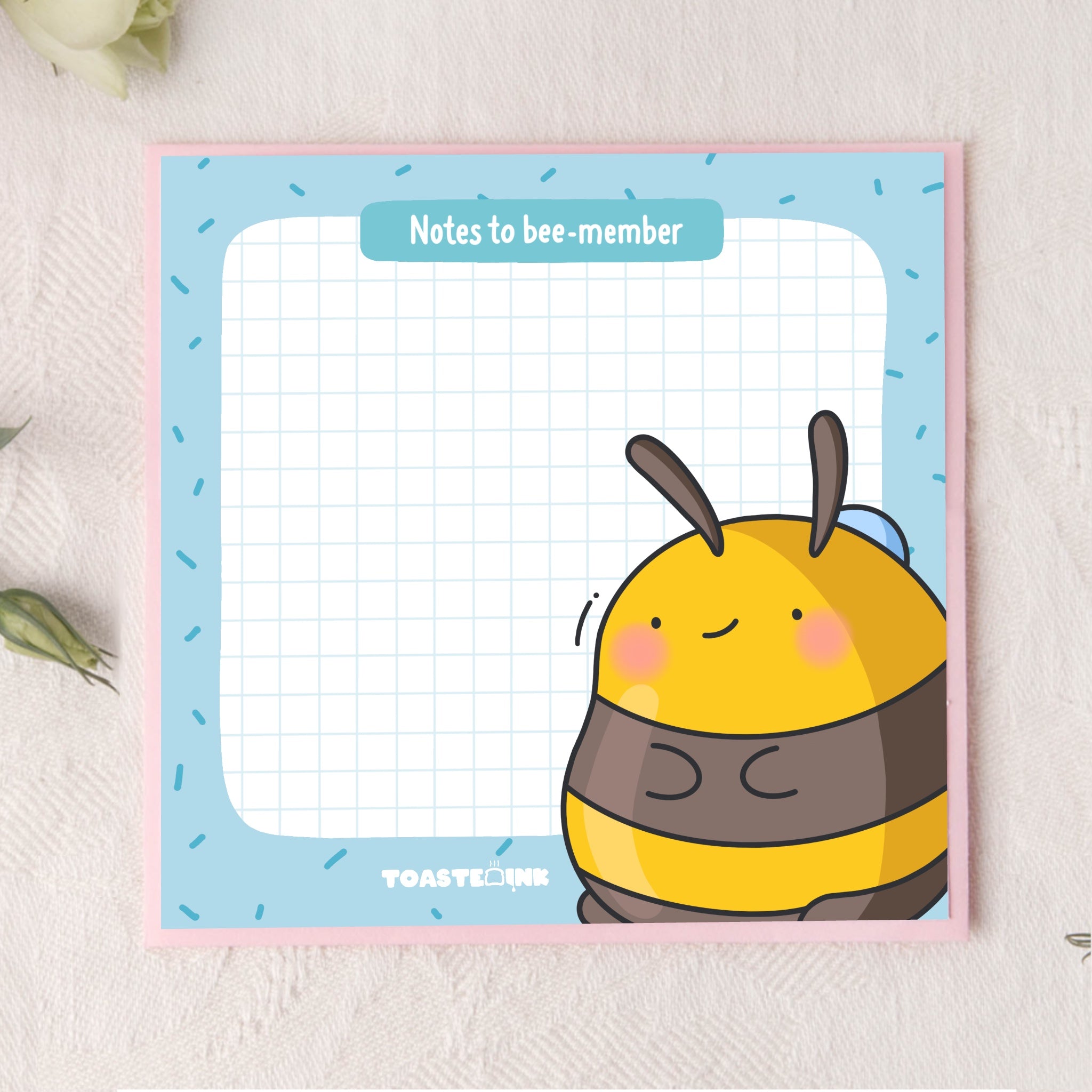 Bee sticky notes on pink background