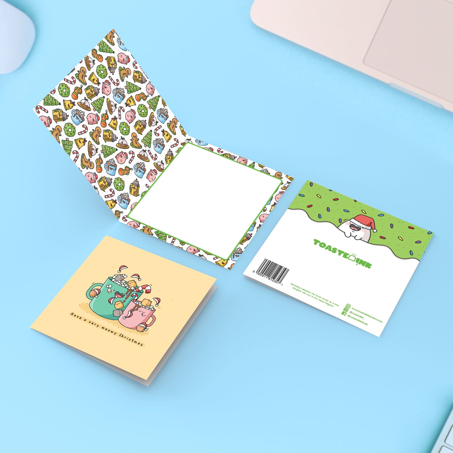 Cat Christmas Card on blue table