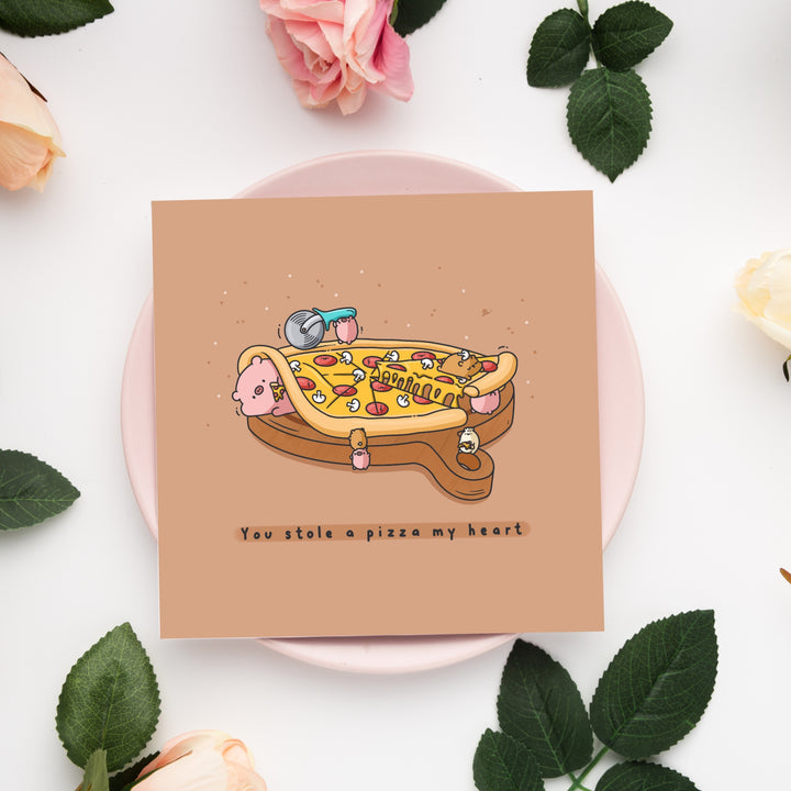 Pizza card on pink plate
