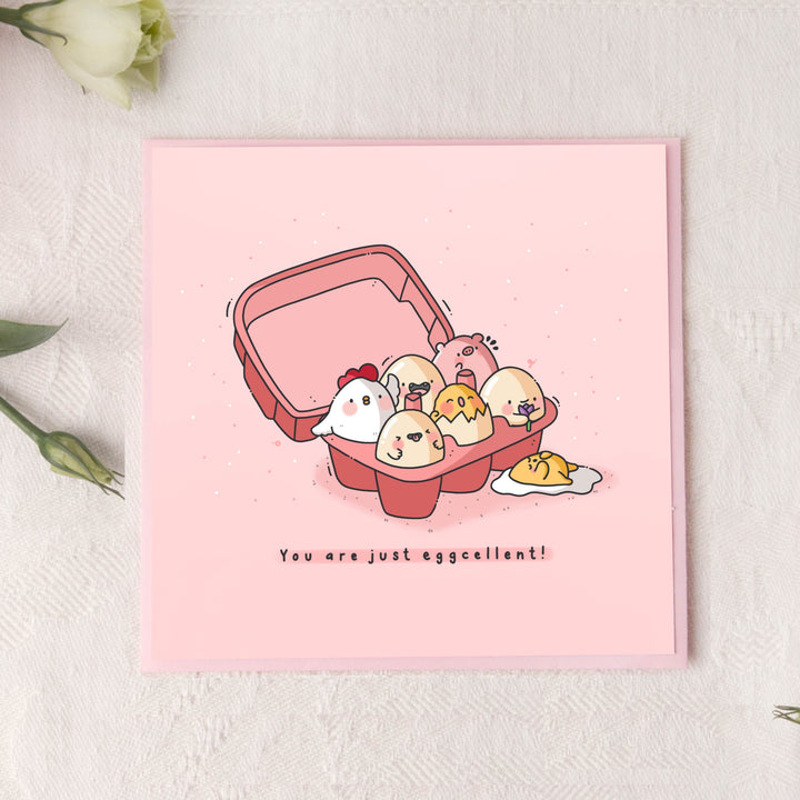 Eggs card on pink background