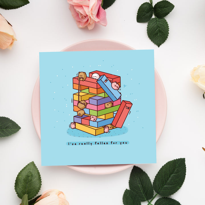 Building blocks card on pink plate