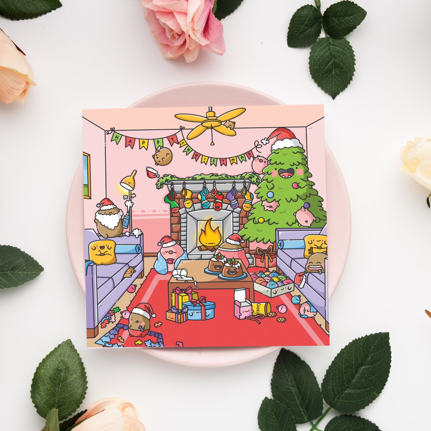 Christmas card on pink plate