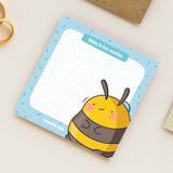 Bee Sticky Notes on beige table
