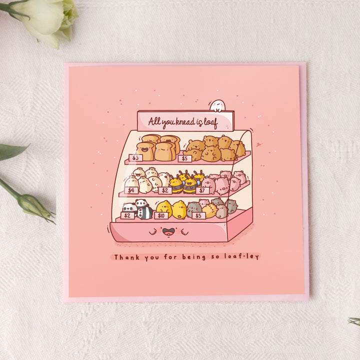 Cute bakery card on pink table