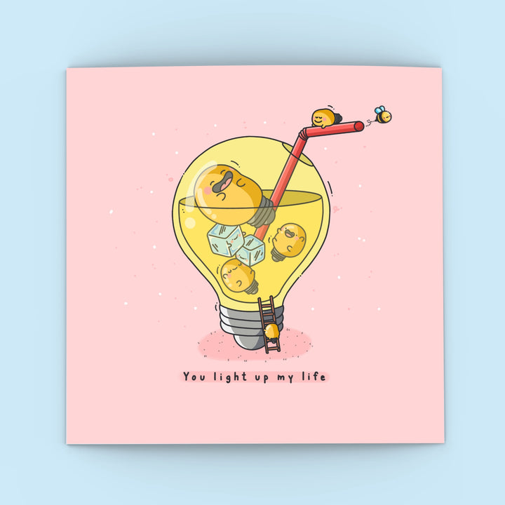 Cute Lightbulb Greetings Card on blue background