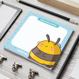 Bee Sticky Notes on grey table