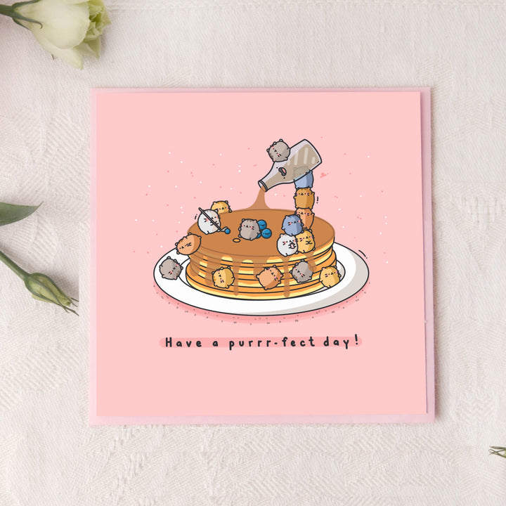 Pancakes card on pink table
