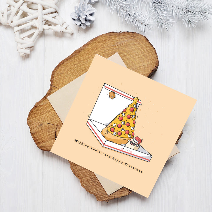 Christmas pizza card on wooden block