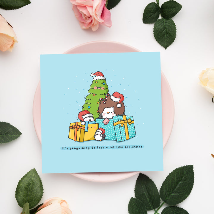 Christmas Penguin card on pink plate