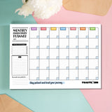Monthly planner on pink and blue background