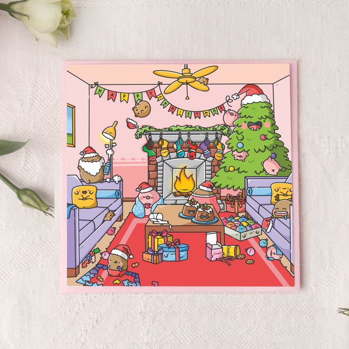 Christmas card on pink table