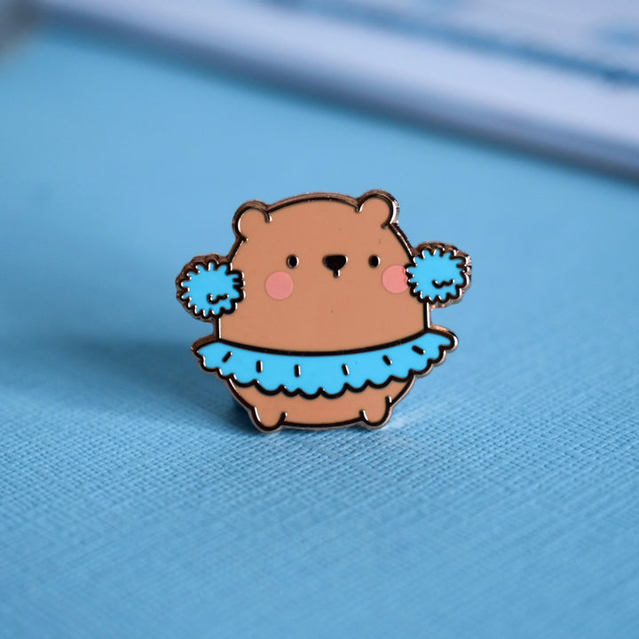 dancing bear pin on blue background