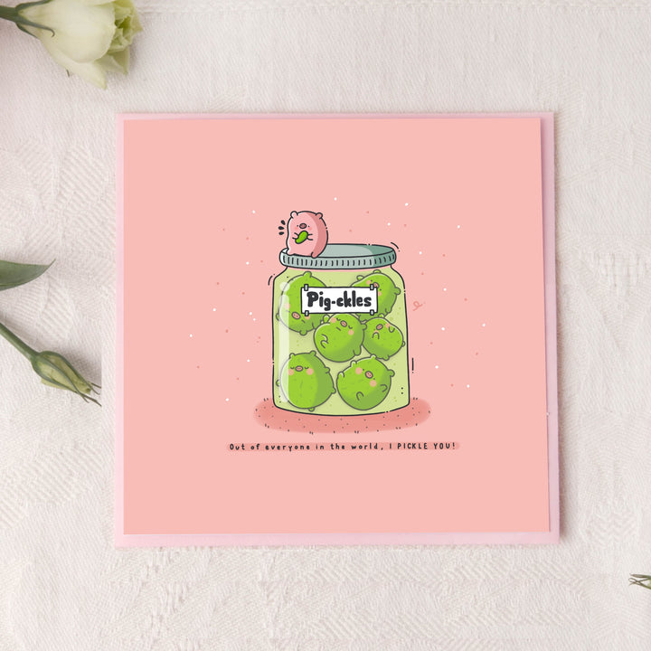 Pickle card on pink background