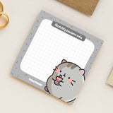 Cute cat sticky notes on beige table
